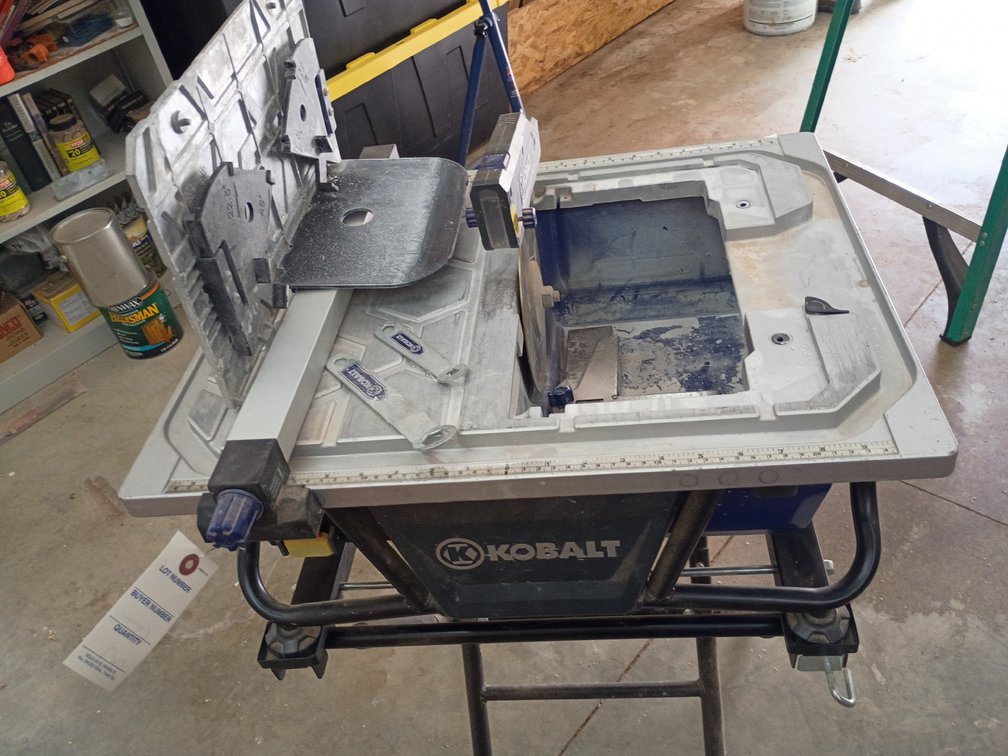 Kobalt wet tile saw with its integrated folding stand.