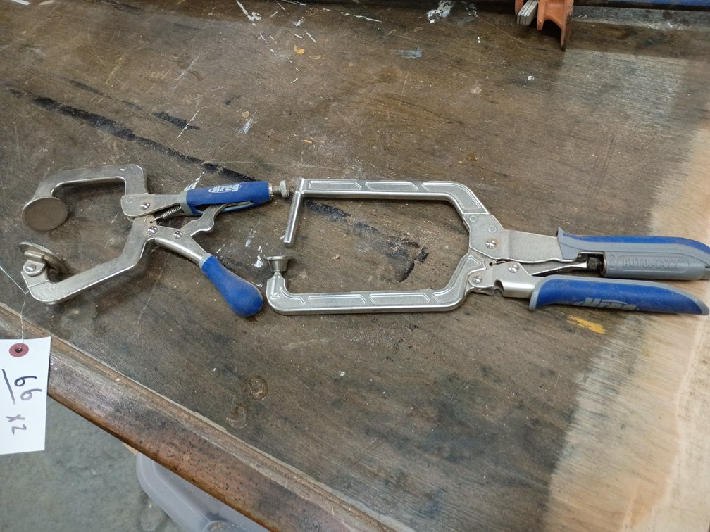 two silver metal woodworking clamps with blue grips, featuring Kreg branding and Auto-Adjust (Automaxx) technology.