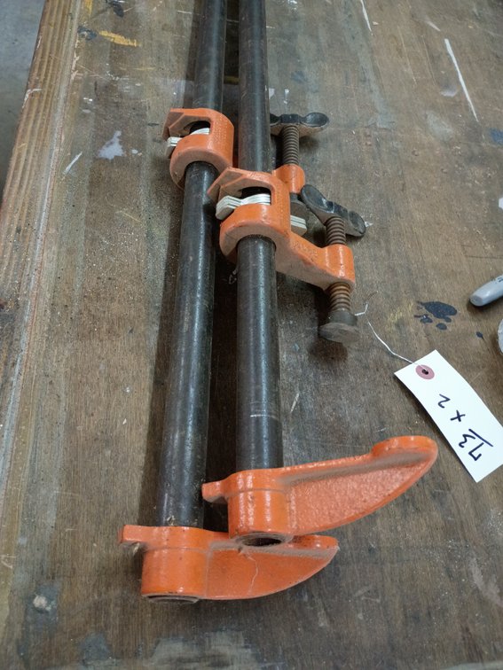 2 orange cast-iron Pony 3/4-inch Pipe Clamp Fixtures 58in.