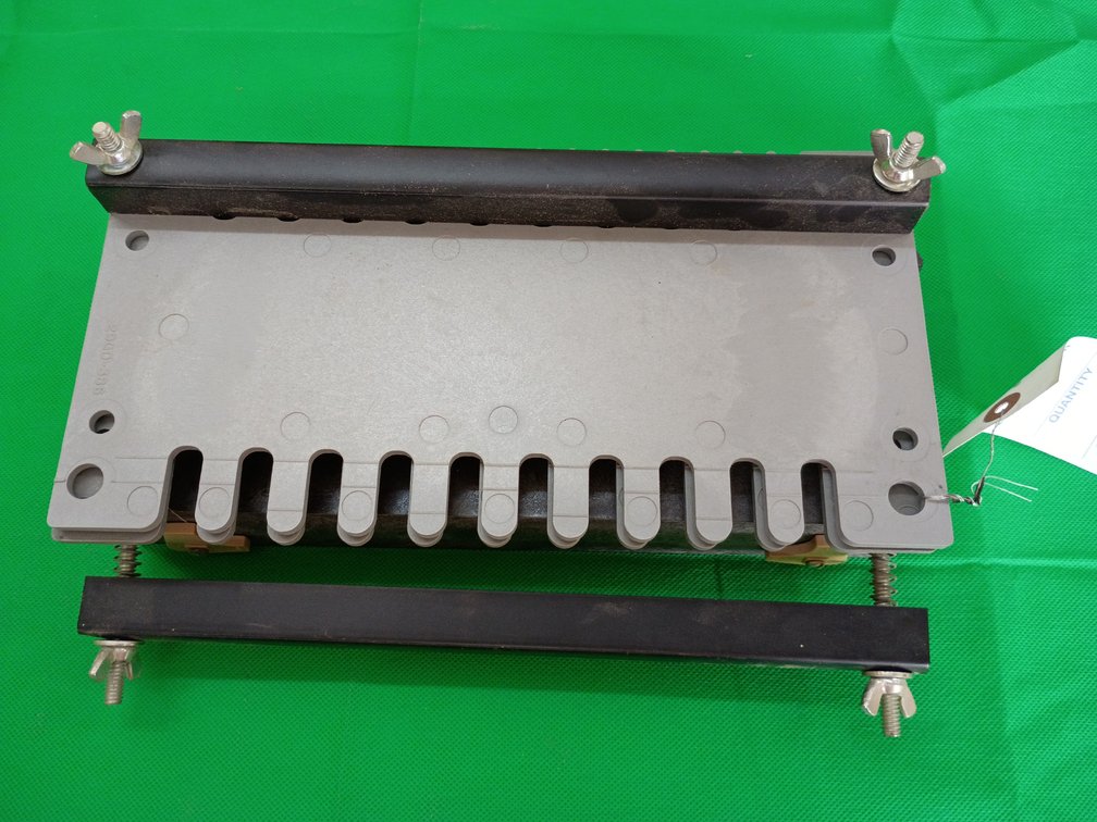 woodworking dovetail jig or fixture used with a router to cut precision dovetail or box joints
