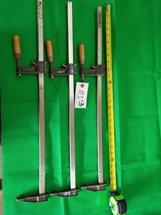 3 heavy-duty F-style bar clamps with wooden handles and a sliding clutch mechanism