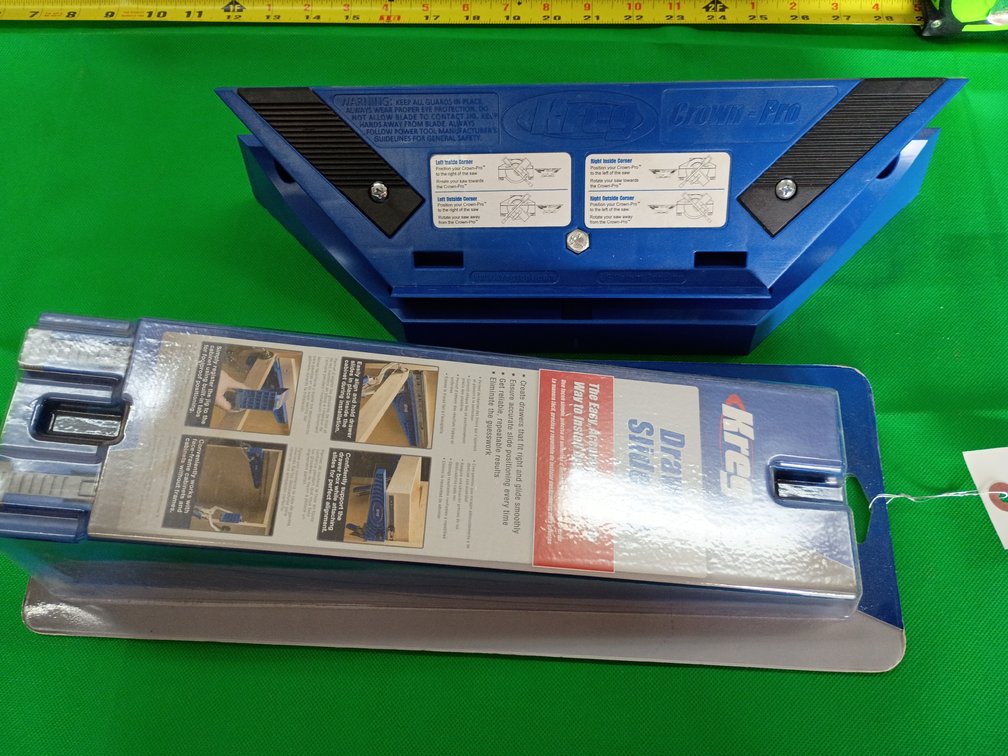 Kreg Crown-Pro Molding Tool (Model KMA2800), a blue plastic cutting jig designed to simplify measuring and cutting crown molding