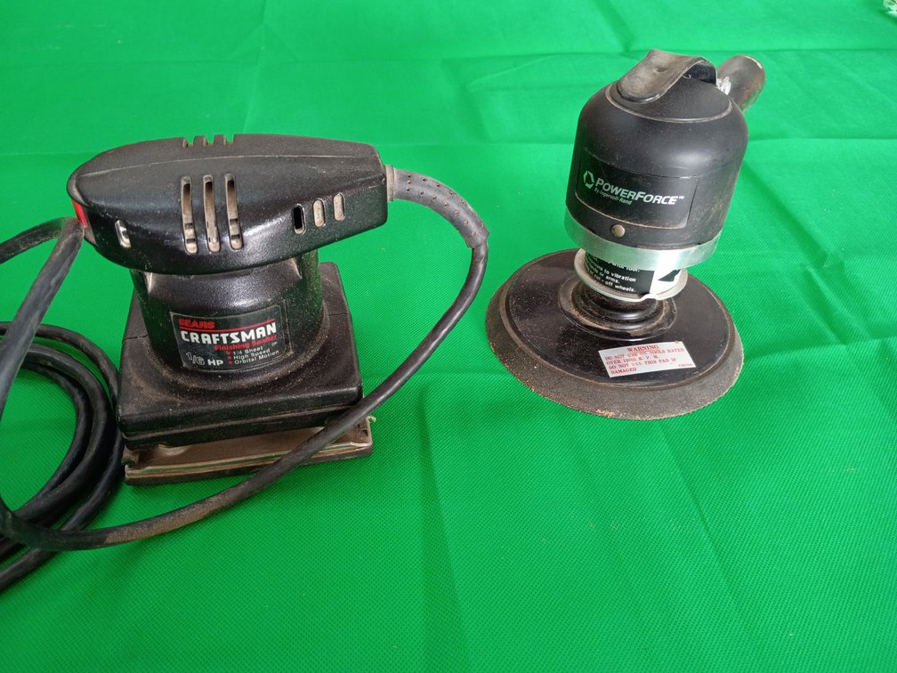 A Craftsman finishing sander and a power force sander