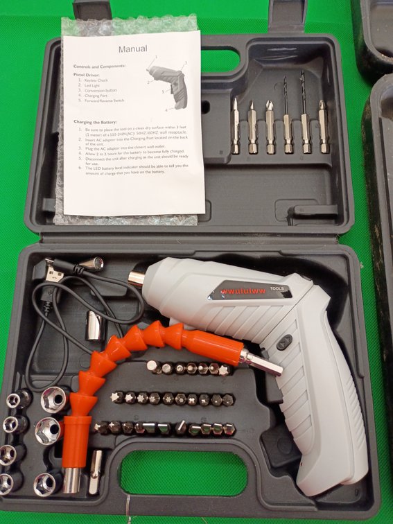 compact, rechargeable 3.6V cordless electric screwdriver and bit set and a Black & Decker corded drill