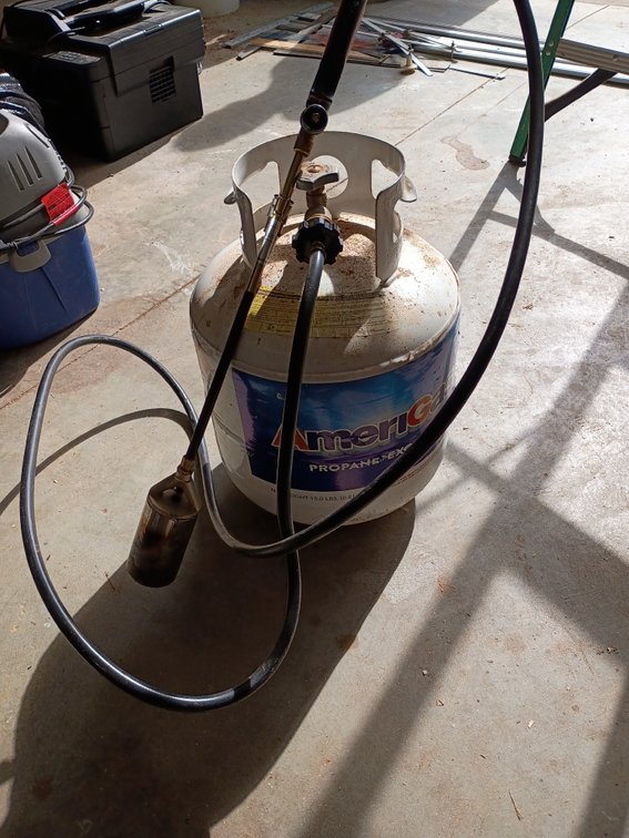 Half tank of propane with flamethrower