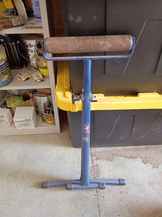 Record Power RPR400 Roller Stand, an adjustable steel support stand used in workshops for handling long pieces of timber, sheet goods, or pipes