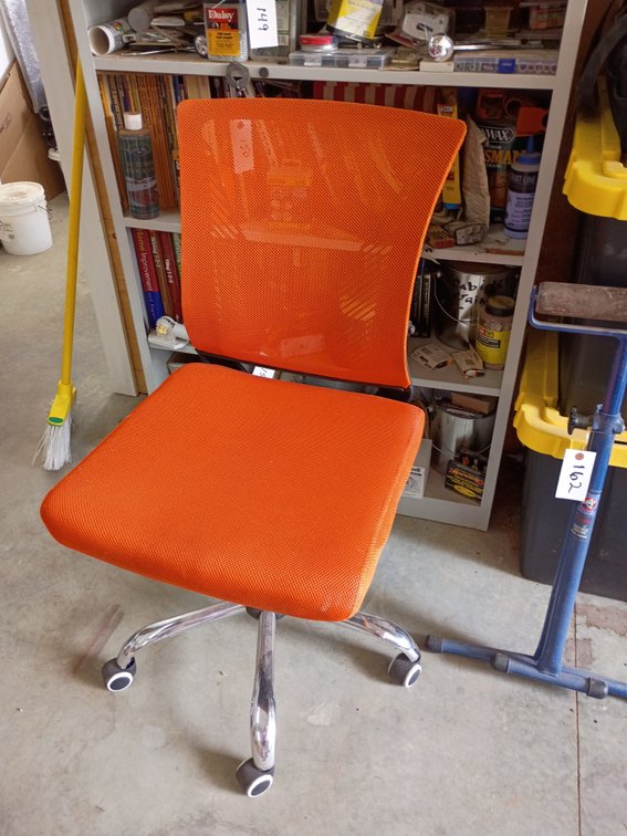 vibrant orange armless mesh and fabric task chair with a chrome-finished rolling base