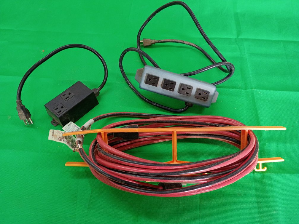 25 ft extension cord and 2 multi plugs