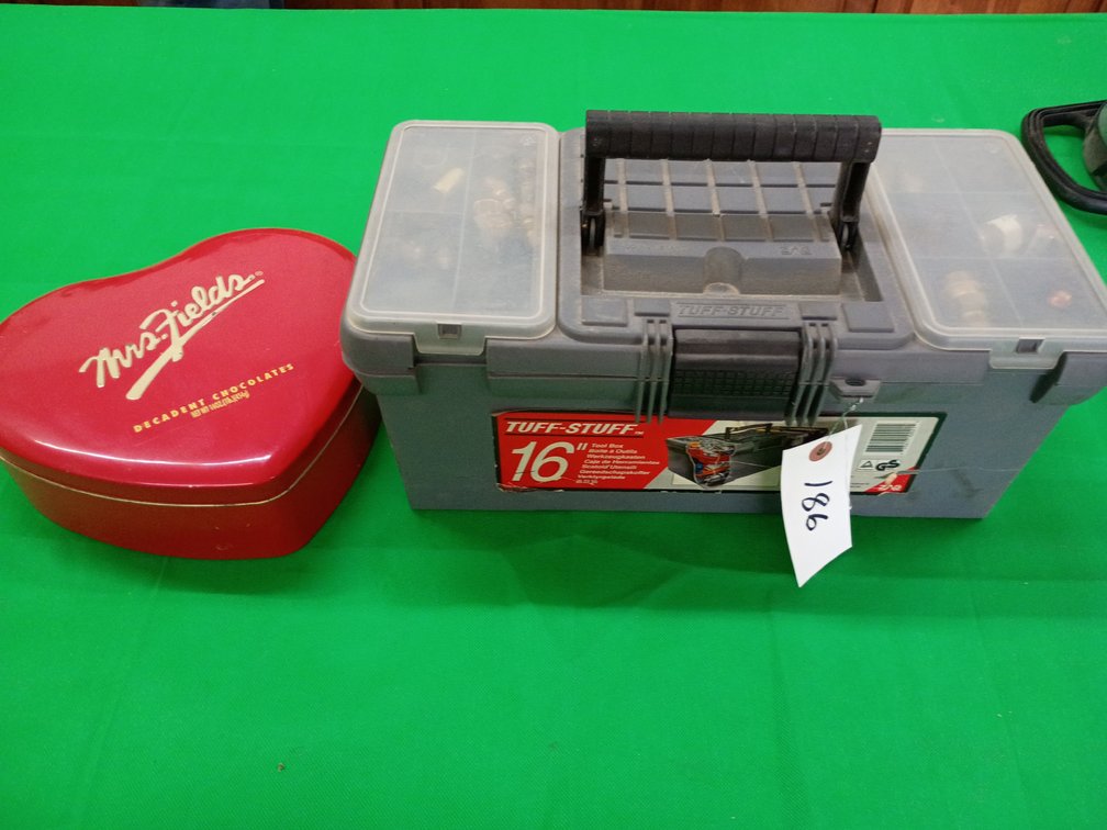 Stuff toolbox and metal Ms Fields chocolate container with various items