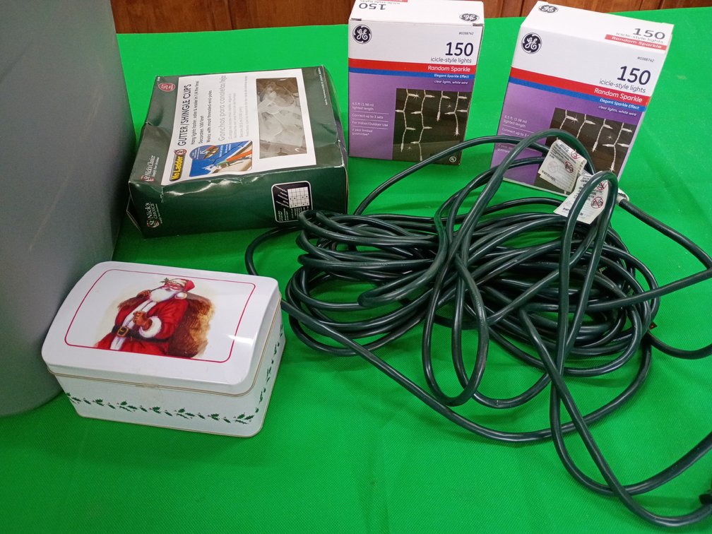 Christmas lights and extension cord in Gray tub