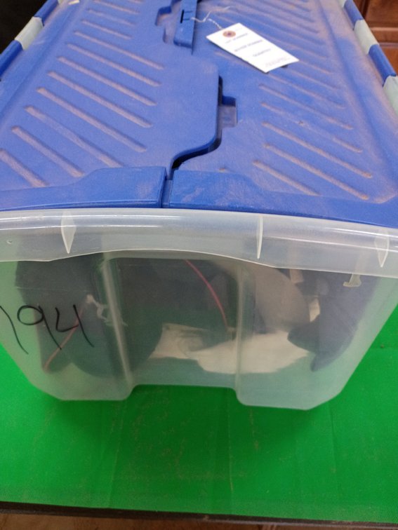 Tub consisting a variety of hats and one jacket