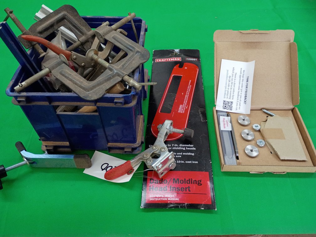 Dado molding head insert clamps