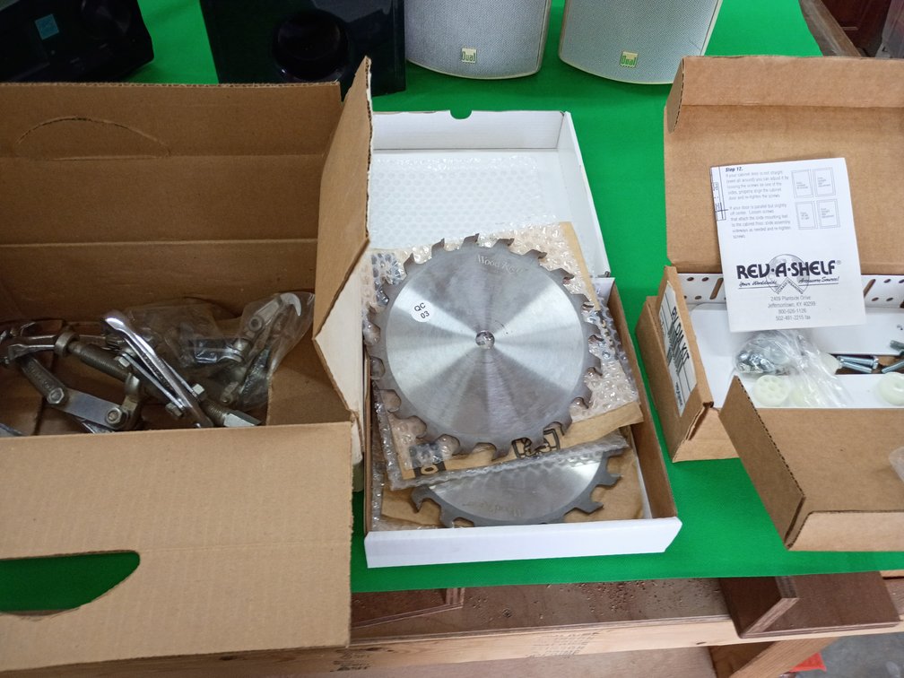 Gear pullers two saw blades two boxes of rev a shelf