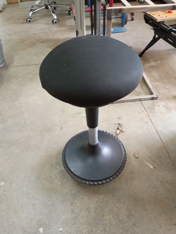 adjustable-height ergonomic balance wobble stool, such as the Uncaged Ergonomics Wobble Stool or a similar model from brands like FlexiSpot