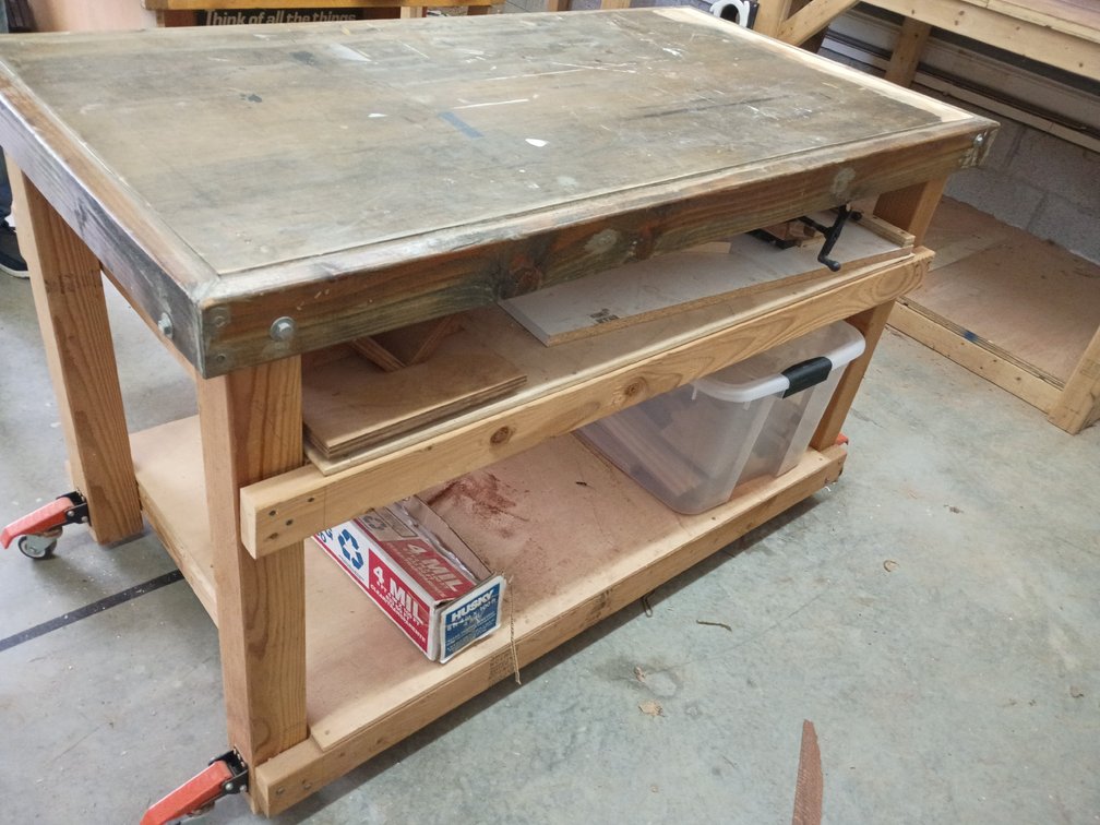Wood shop table with accessories and extra wood 5 ft by 3 ft