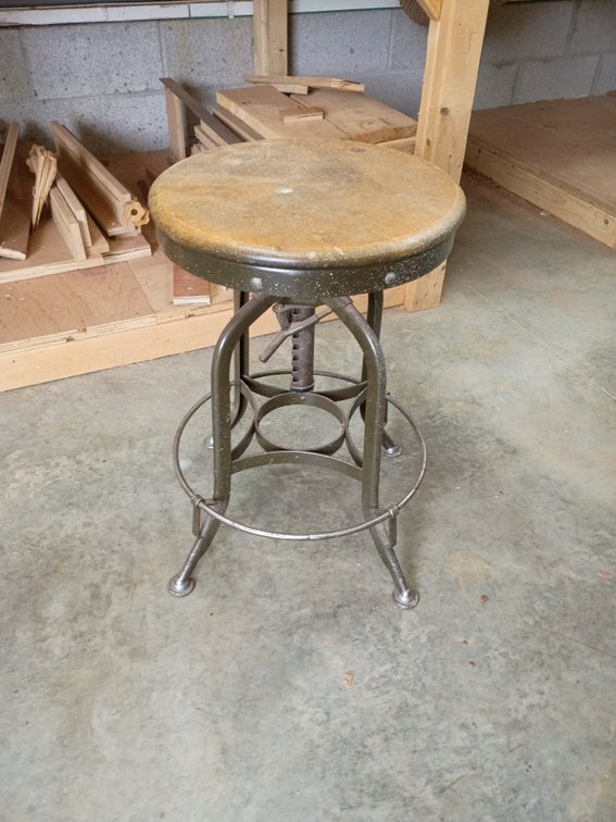 vintage industrial adjustable stool, likely made by the Toledo Metal Furniture Company (or Uhl Art Steel) from the Depression or mid-century era, featuring a round seat,