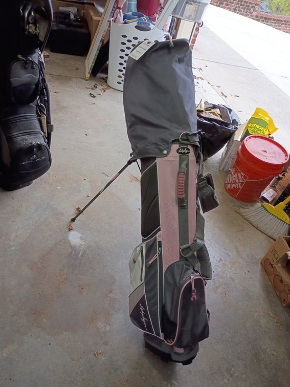 Lady Hagen Inspire women's golf stand/carry bag (often part of a breast cancer awareness edition featuring pink accents and a ribbon and clubs