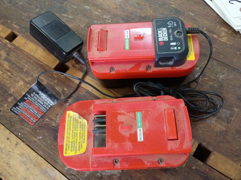 Black & Decker charger and 18 volt battery and hedge trimmer