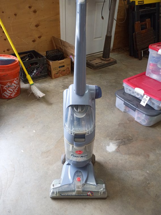 Hoover FloorMate Hard Floor Cleaner wet/dry vacuum cleaner, which washes, scrubs, and dries sealed hard floors like hardwood, tile, laminate, and viny