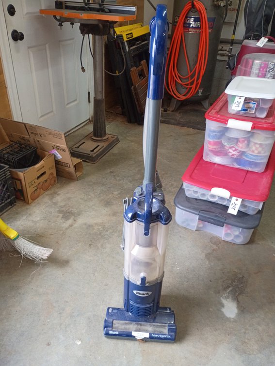 Shark Navigator Light Upright Vacuum (Model NV105), a corded and bagless upright vacuum cleaner