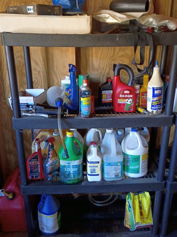 Four tier shelving with items on it
