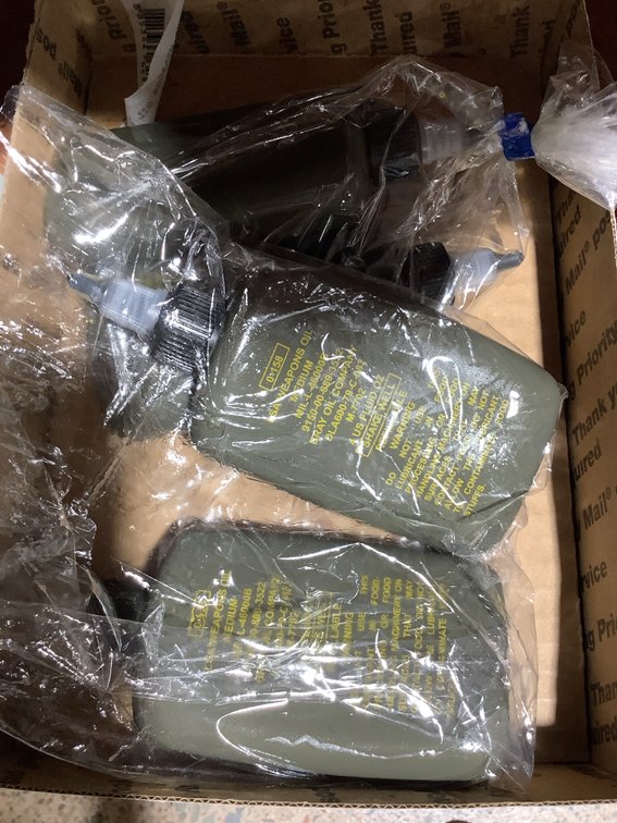 4 - 4oz size bottles of gun oil
