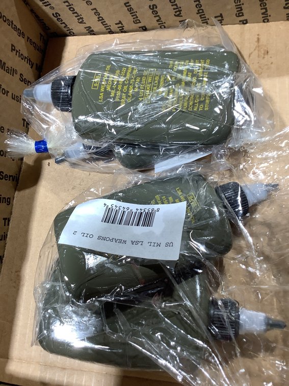 4 - 4oz size bottles of gun oil