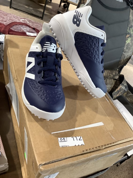 Brand new kids size 10.5 New Balance turf shoes