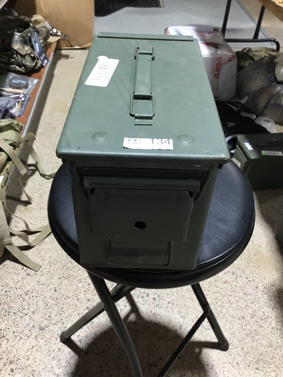 A green military metal ammunition box