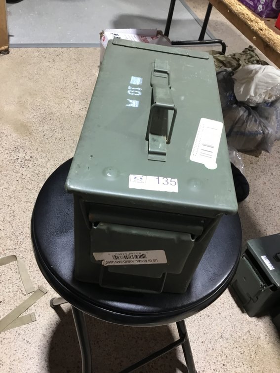 A green military metal ammunition box