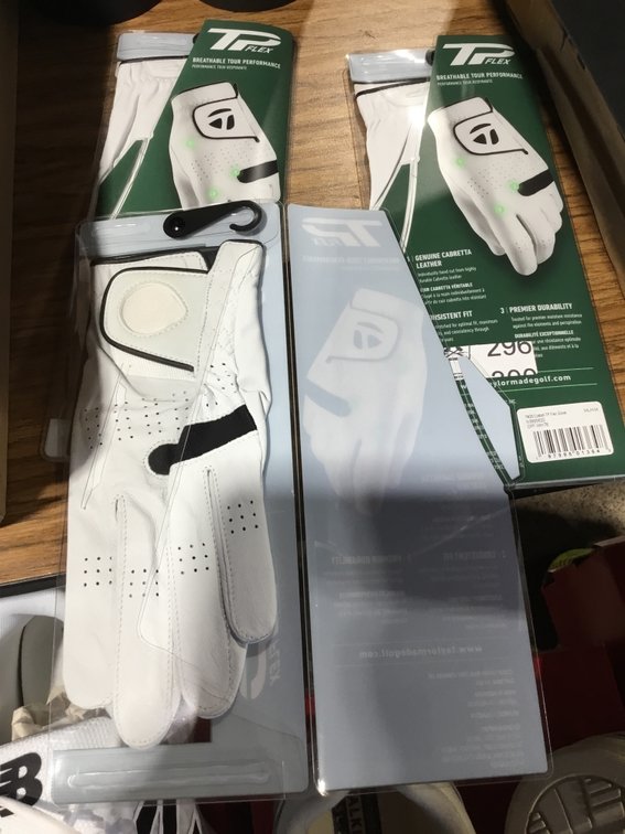Three brand new tailor-made golf gloves