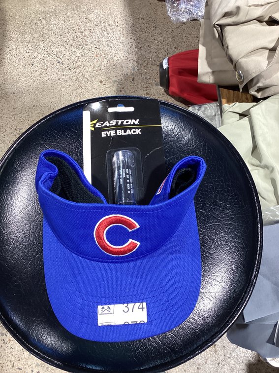 Cubs visor and eye black stick
