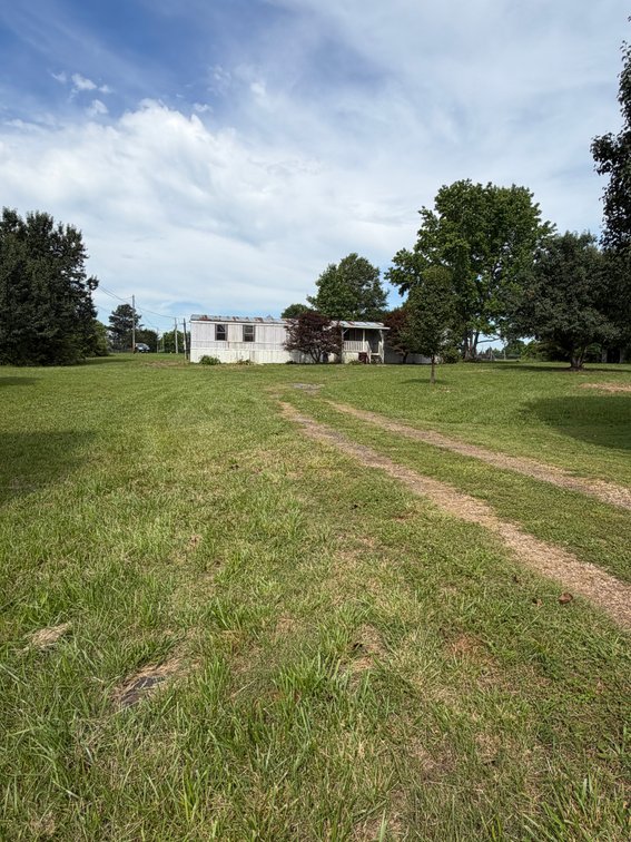 Image for ONLINE AUCTION ONLY!  3 bed 2 bath 16x76 mobile home on 1.39 un-restricted acres - beautiful lot!