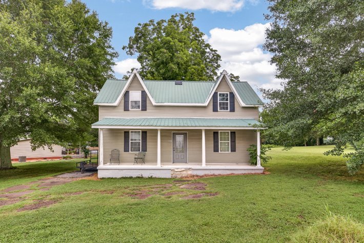 ONLINE AUCTION ONLY- 1,558 sq ft , 2 bedroom, 2 bathroom partially renovated home on .60 acre lot  in Ardmore Tennessee