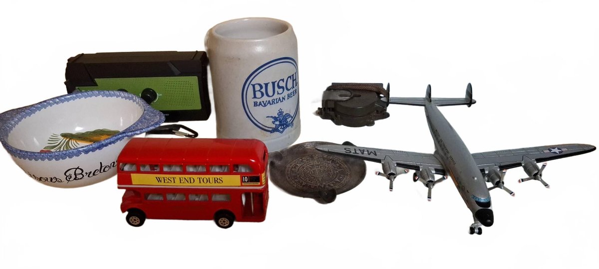 Collectibles: Compass, Stein, Bus, Plane