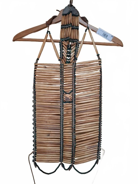 Beaded Bone and Wood Breastplate with Eagle Carving
