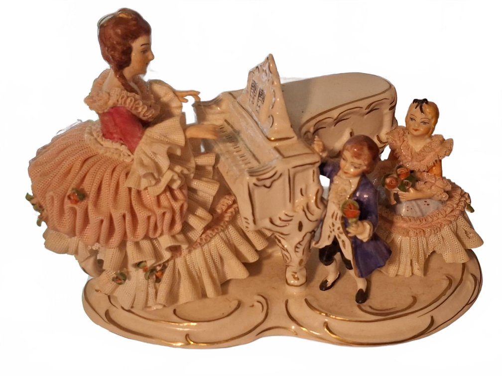 Porcelain Figurine Group With Piano and Crown Mark