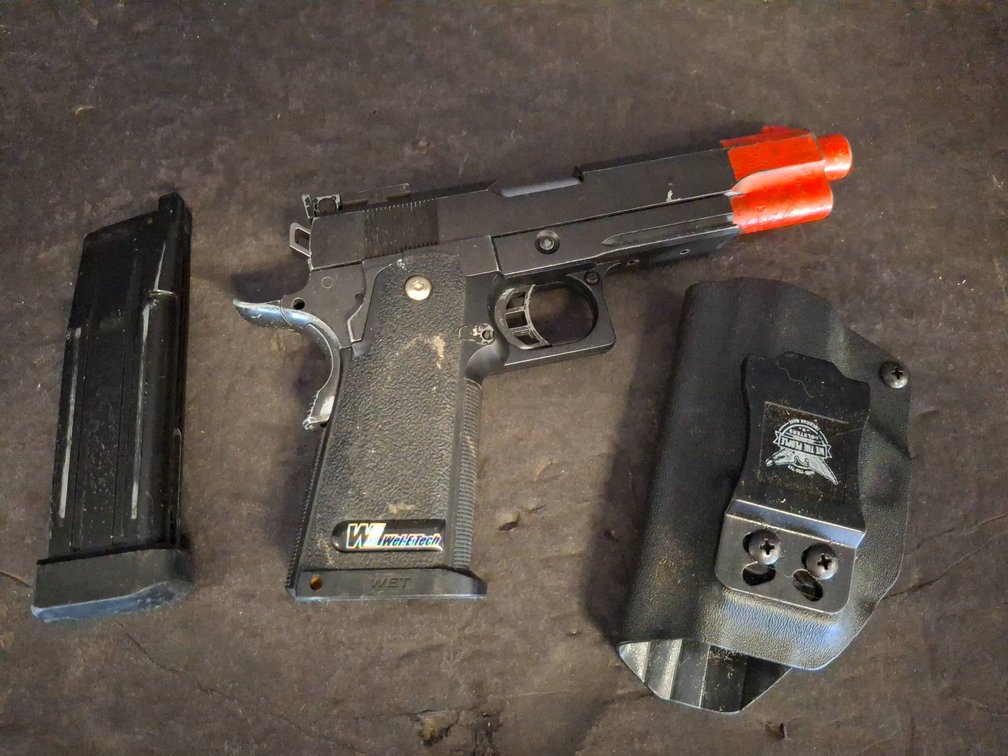 WE Tech Airsoft Pistol with Magazine and Holster