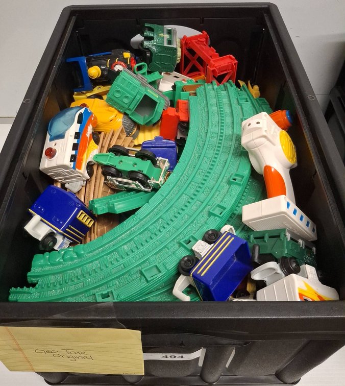 Bin of GeoTrax Train Sets and Track Pieces