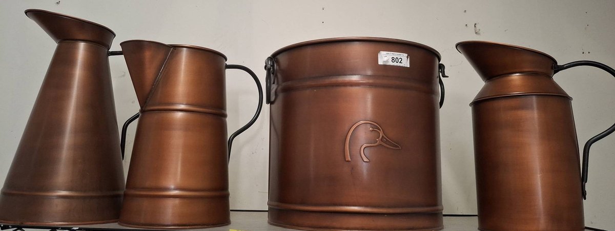 4 Copper-Tone Metal Pitchers & Bin
