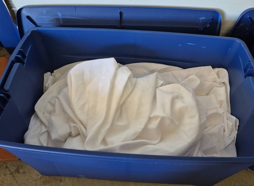 Blue Storage Bin With White Cloth