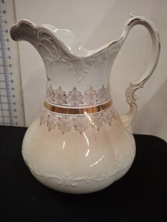 Ornate Ceramic Pitcher with Gold Accent Band