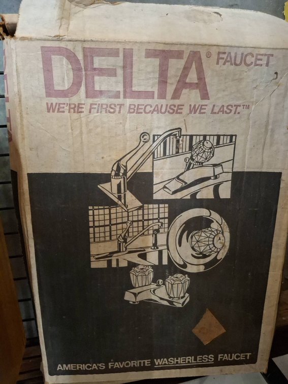 Delta Faucet With Mounting Hardware in Box