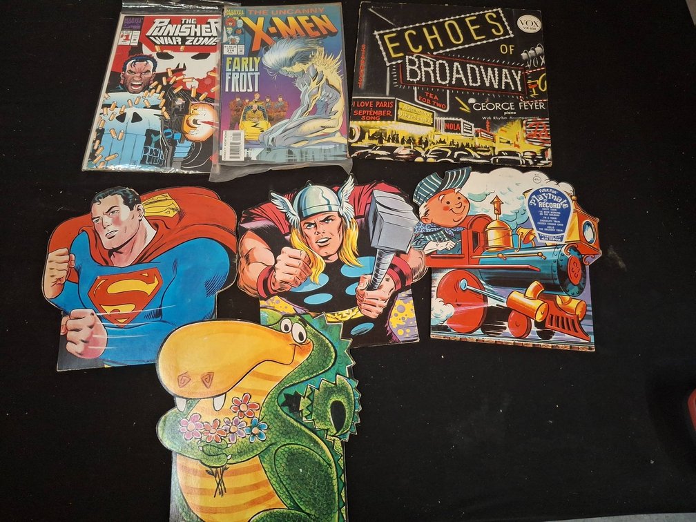 Comic Books And Shaped 45 RPM Records