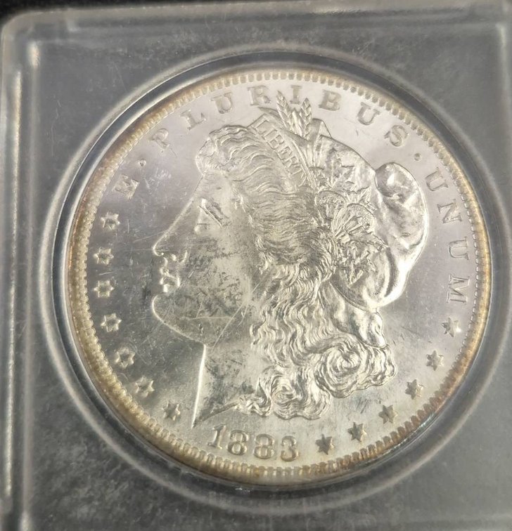 1883-O Morgan Silver Dollar in Plastic Case