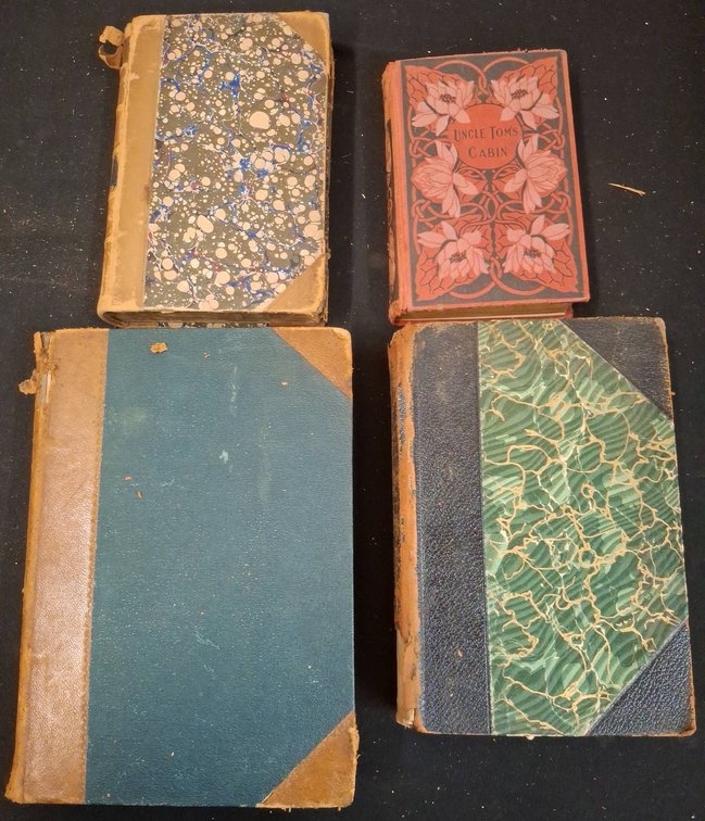 Four Assorted Decorative Hardcover Books