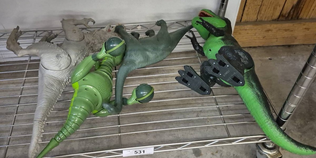 Four Assorted Dinosaur Toys