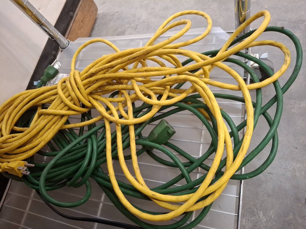 Two Extension Cords Green and Yellow