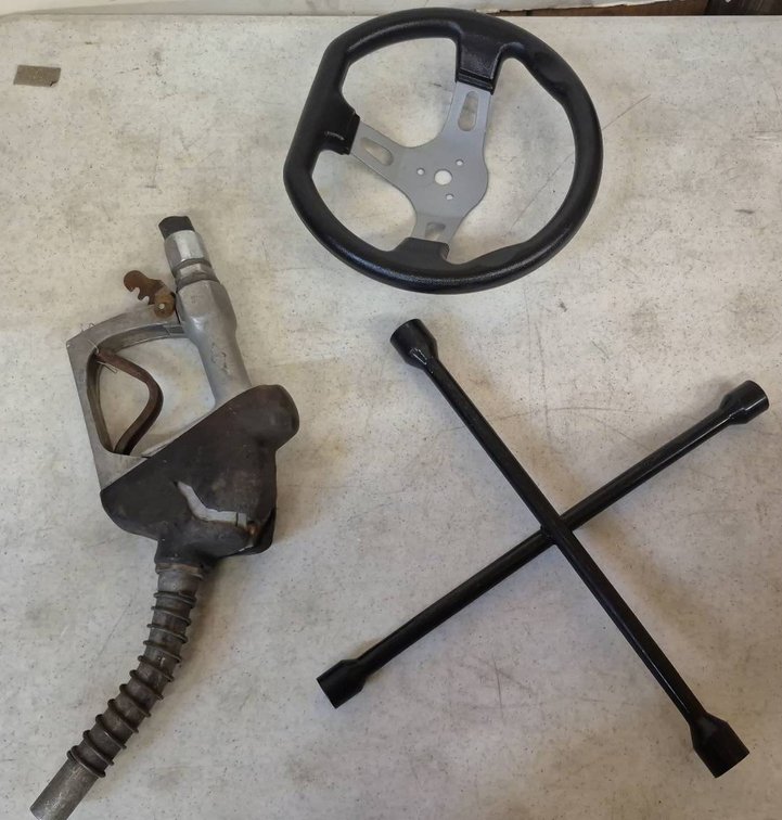 Gas Nozzle, Steering Wheel, Lug Wrench