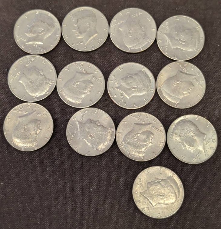 13 Kennedy Half Dollar Coins all different Dates